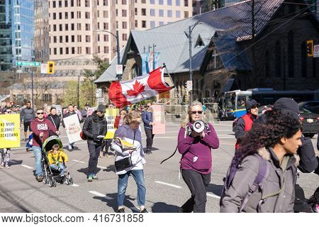 Downtown Vancouver, Bc, Canada - Apr 02, 2021: Anti Lockdown Protesters March In Protest Of Governme