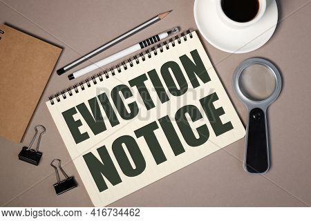 Eviction Notice. Text On White Paper On Brown Background