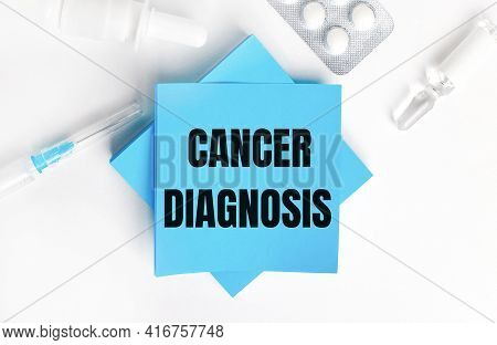 On A White Background, A Syringe, Ampoule, Pills, A Vial Of Medicine And Light Blue Stickers With Th