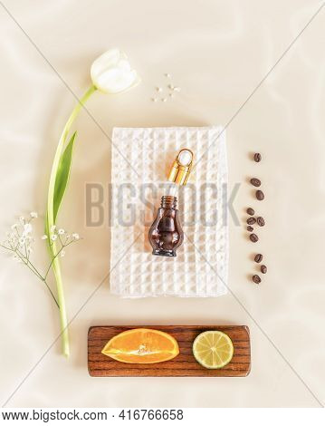 Eco Friendly, Cosmetic Composition With White Towel, Bottle Of Serum, Orange, Laim, Coffee Beans, Se