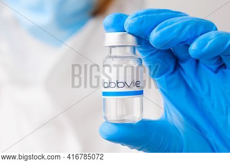 Abbvie Vial Or Bottle For Injection With Pharmaceuticals Or Drugs In Scientist Hands In Rubber Glove