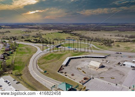 High Drone View Above Highways, Interchanges The Roads On Interstate Takes You On A Fast Transportat