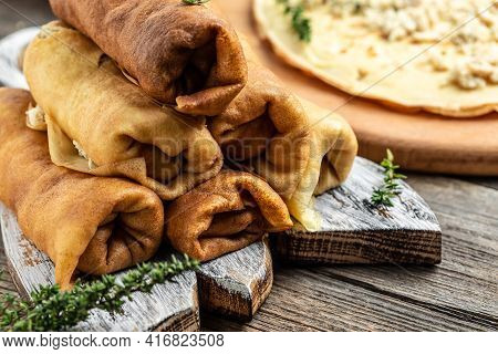 Hill Of Pancakes With Chicken Meat And Cheese. Traditional Maslenitsa Meal. Homemade Filled By Chick