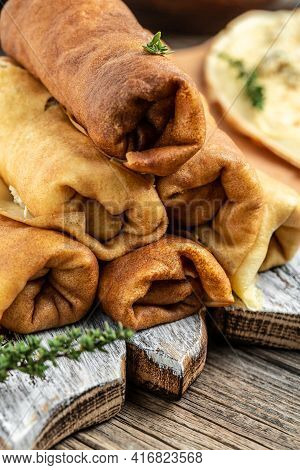 Hill Of Pancakes With Chicken Meat And Cheese. Traditional Maslenitsa Meal. Homemade Filled By Chick
