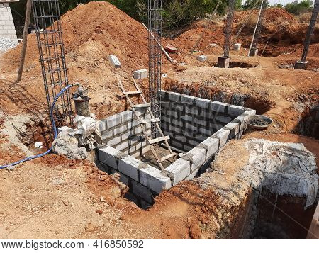 Closeup Of Construction Of New Building With Cement Block And M Sand Or Artificial Sand At Empty Fie