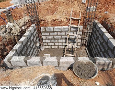 Closeup Of Construction Of New Building With Cement Block And M Sand Or Artificial Sand At Empty Fie