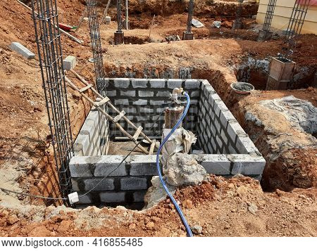 Closeup Of Construction Of Building Indian House With Pillar, Beam, Pit And Water Sump Construct Usi