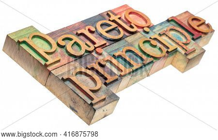 Pareto principle - isolated word abstract in wood letterpress printing blocks stained by color inks, business, productivity, resource allocation and priorities concept