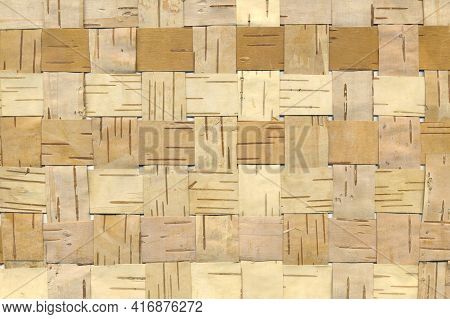 Wicker Background From Birch Bark Strips. Natural Material. Texture Of Inner Layers Of Birch Bark Of