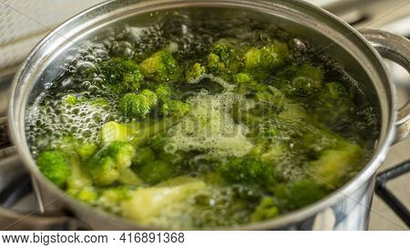 Broccoli Is Cooked In A Saucepan On The Stove Close Up