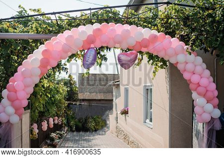 Wedding Arch Made Of Colorful Inflatable Balloons. Celebration Of A Children's Party. Arch Made With