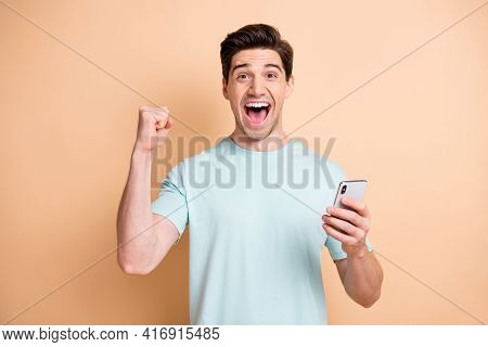 Portrait Of Nice Cheerful Lucky Guy Blogger Influenzer Using Device Having Fun Rejoicing Isolated Ov
