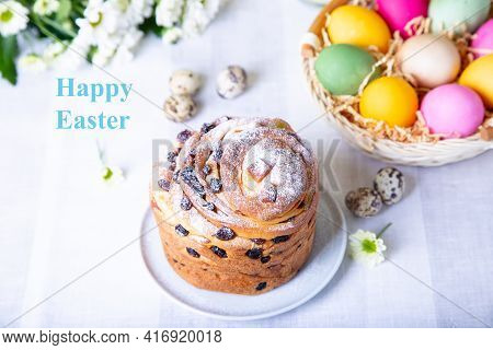 Craffin (cruffin) With Raisins And Candied Fruits. Easter Cake Kulich And Painted Eggs. Easter Holid