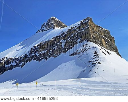 Snowy Alpine Mountain Peak Oldenhorn (oldehore Or Becca D\'audon) Located In A Mountain Massif Les D