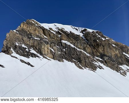 Snowy Alpine Mountain Peak Oldenhorn (oldehore Or Becca D\'audon) Located In A Mountain Massif Les D