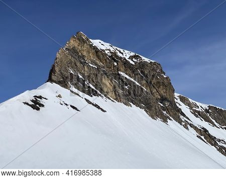 Snowy Alpine Mountain Peak Oldenhorn (oldehore Or Becca D\'audon) Located In A Mountain Massif Les D