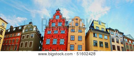 Red And Yellow Iconic Buildings On Stortorget, A Small Public Square In Gamla Stan, The Old Town In