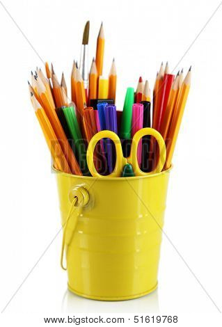 Colorful pencils and other art supplies in pail isolated on white