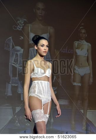 GRANADA SPAIN - NOVEMBER 17, 2012: a model walks the catwalk at the First Bridal Fair Granada
