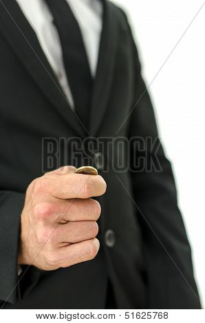 Detail Of Businessman Tossing A Coin.