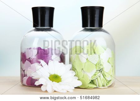 Aromatherapy minerals - colorful bath salt on light background