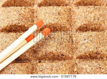 Long matches and dry fuel, close up
