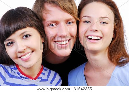 Portrait of three teengers friends on white