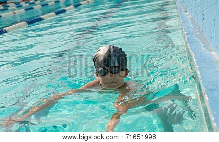 Children swimming and playing in water, happiness and summertime.