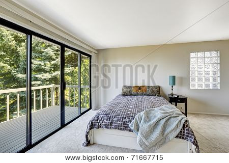 White Refreshing Bedroom Interior With Walkout Deck