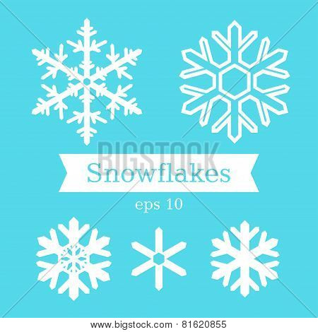 White Snowflakes On A Blue Background