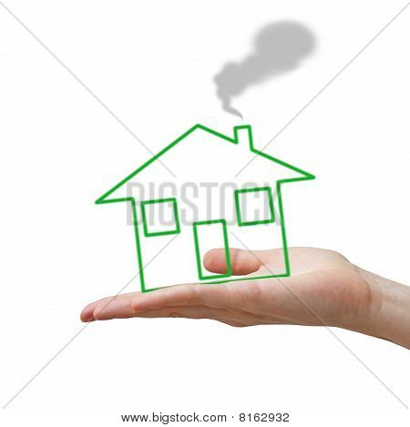 Hand mit grün Konzept hause