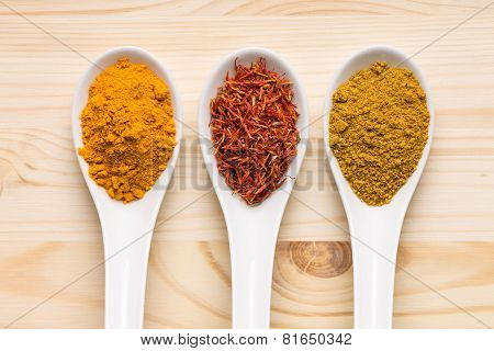 Various Spices On Wooden Background