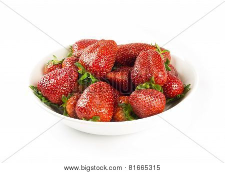 strawberries in white bowl