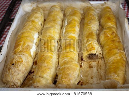 Homemade Cottage Cheese And Apple Strudel Dessert On Baking Pan