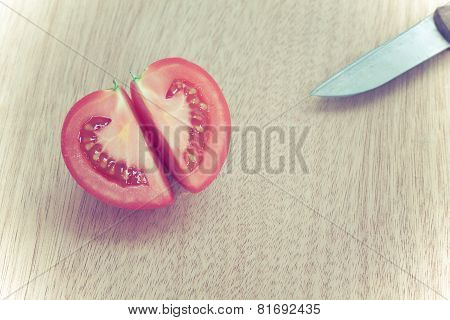 Half Cut Cleave Of Red Potato,look Llike Heart Shape,with Knife On Wooden Board