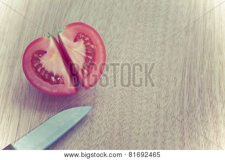 Half Cut Cleave Of Red Potato,look Like Heart Shape,with Knife On Wooden Board