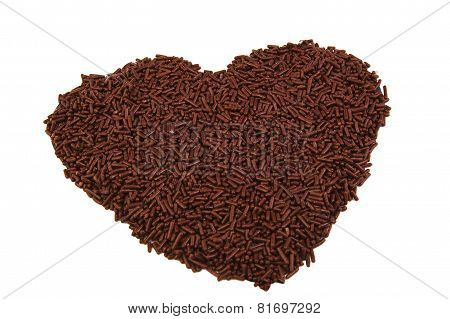 Heart shape formed with chocolate sprinkles isolated on white background. Love. Valentine's Day