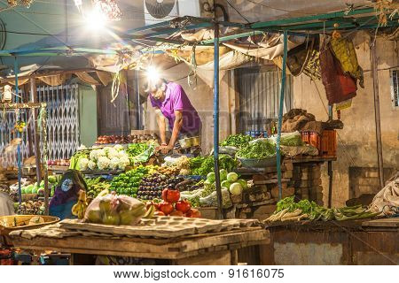 Seller At The Vegetable Night Market