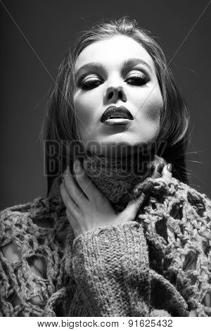 Portrait Of Tender Passionate Woman In Knitted Jacket