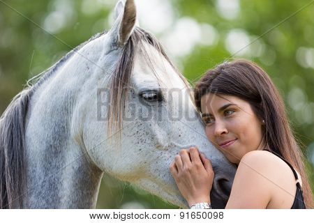 Young Woman With Her Horse