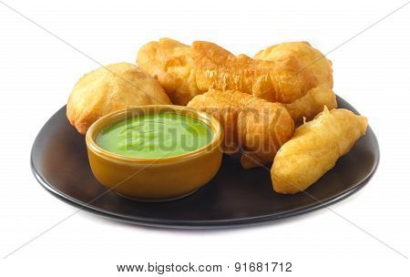 Dish Of Deep-fried Doughstick On White Background