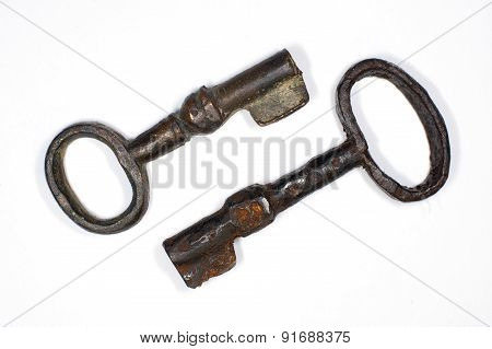 Two Old Keys To The Safe On A White Background