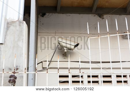 The Old CCTV Security Camera operating long time on wall, CCTV Camera concept, CCTV Camera background, CCTV Camera idea, CCTV Camera copy space, CCTV Camera video.