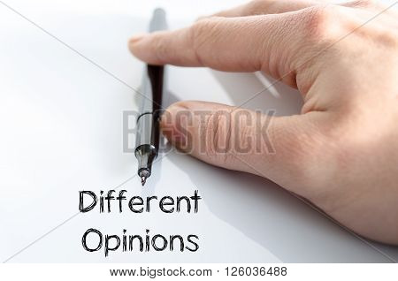 Different opinions note in business man hand