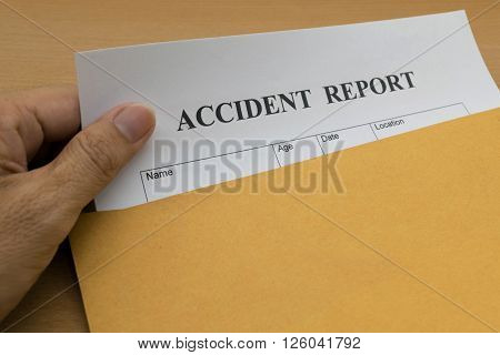 Accident report form on brown envelope,  health, office, financial,