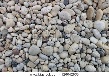 Pebble stones on coastline, round, sea, seashore,