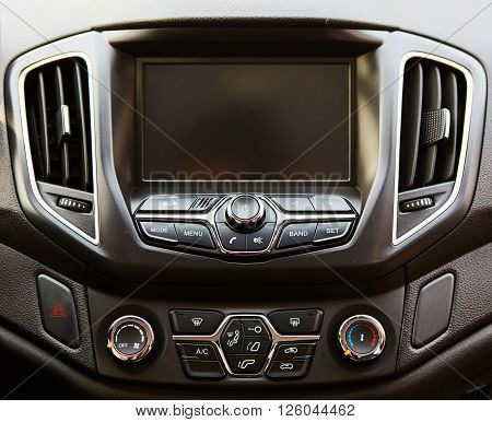 The modern car dashboard. Screen multimedia system.