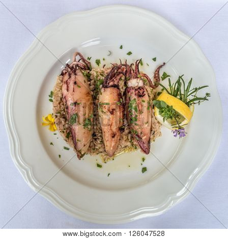 Delicius squid stuffed with rice and lemon