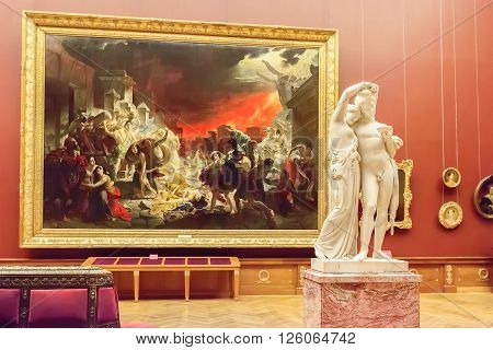 SAINT PETERSBURG RUSSIA - APRIL 11 2016: Room with paintings Karl Brullov in State Russian Museum. The museum is the largest depository of Russian fine art in St. Petersburg