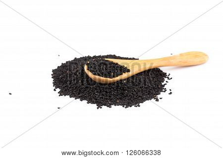 Heap Of Black Sesame On Wooden Spoon